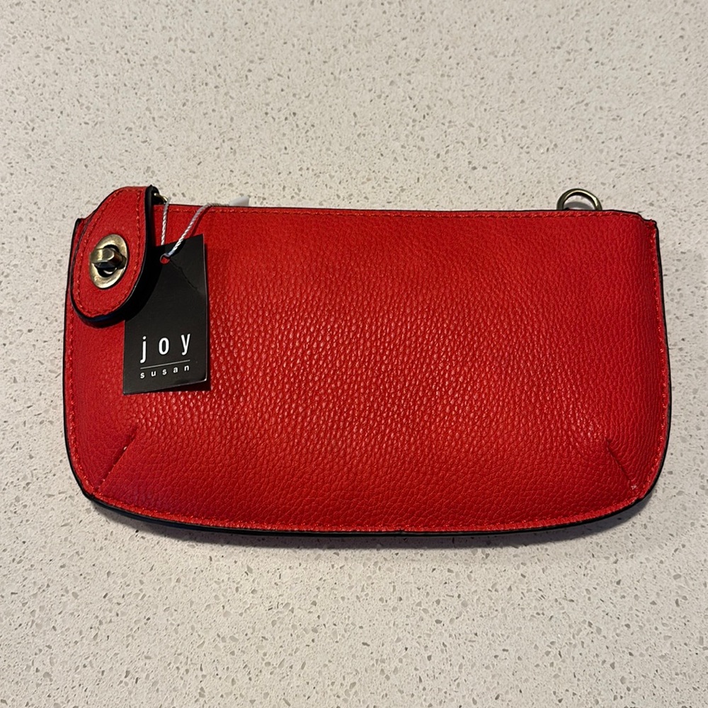 Red leather Joy Susan crossbody and wrist clutch straps